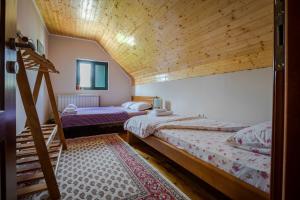 Letto o letti in una camera di Guest house Heaven