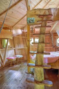 Postel nebo postele na pokoji v ubytování L'Arbre à Cabane + 37 fotografií