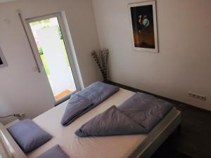 Postel nebo postele na pokoji v ubytování Apartment unterm Schloss + 30 fotografií