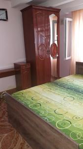 Postel nebo postele na pokoji v ubytování liziko's House