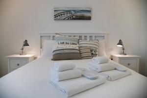 Tempat tidur dalam kamar di Bianco di Mare