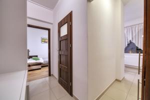 Posteľ alebo postele v izbe v ubytovaní Dream Loft Rajska