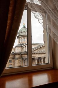 a window with a view of a building at Best View Kazanskaya in Saint Petersburg