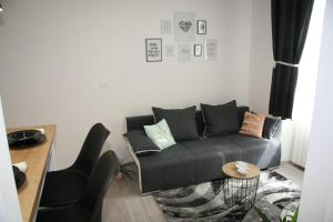 Posezení v ubytování Stylish Apartment in City Center