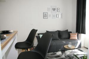 Posezení v ubytování Stylish Apartment in City Center
