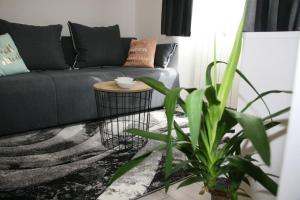 Posezení v ubytování Stylish Apartment in City Center