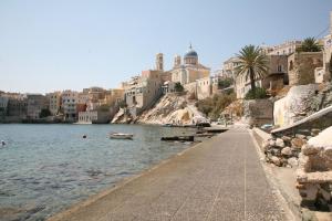 a city with buildings and a body of water at Caviri in Galissas +51 photos