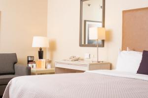 Postel nebo postele na pokoji v ubytování iStay Hotel Ciudad Juarez