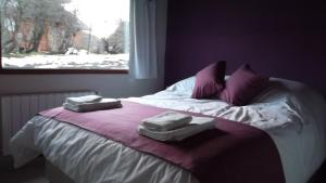 Кровать или кровати в номере Altos del Catedral