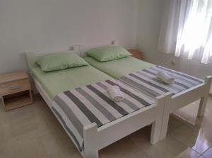 Ліжко або ліжка в номері Agava Apartments Mokalo