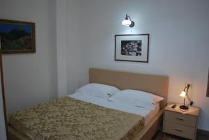 Postel nebo postele na pokoji v ubytování Hotel Boutique Osumi