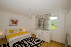 Voodi või voodid majutusasutuse Rooms Leda toas