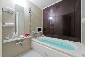 Vannituba majutusasutuses Hotel ROY YOKOHAMA