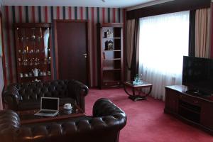 TV a/nebo společenská místnost v ubytování Hotel Druzhba