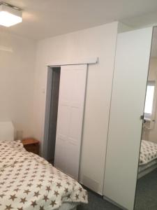 Postel nebo postele na pokoji v ubytování Apartmán Brno Jelenice