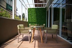 Balkón nebo terasa v ubytování Verse Luxe Hotel Wahid Hasyim