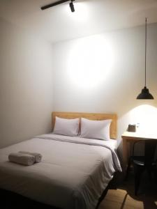 Voodi või voodid majutusasutuse PINX'S HOSTEL toas