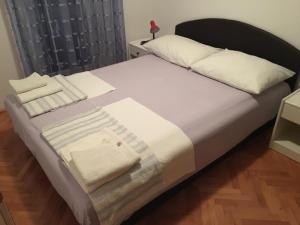 Cama o camas de una habitación en KAMENA Apartment & Studio