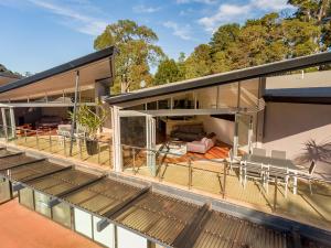 an aerial view of a house with a large balcony at Central Avenue Apartments in Margaret River Town