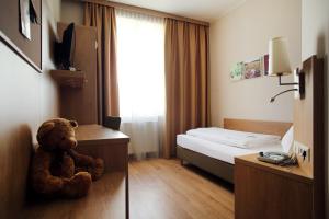 Katil atau katil-katil dalam bilik di Hotel Babenbergerhof