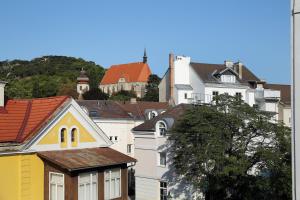 a group of houses and roofs in a city at Hotel Babenbergerhof in Mödling