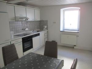 Kjøkken eller kjøkkenkrok på Schöne 66 m² Ferienwohnung in Main-Spessart