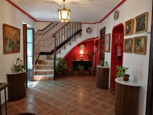 The lobby or reception area at Hostal Maestre