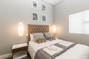 Säng eller sängar i ett rum på Suburban Bliss Durbanville