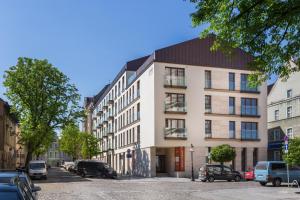 Budova, v ktorej sa apartmán nachádza + 37 fotografií