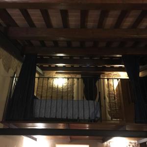 a balcony with a bed in a room at Residence LA FORTUNA in Fano