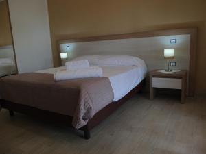 Кровать или кровати в номере Villa Santangelo