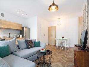 Uma área de estar em Apartments Old town Cracow Krasińskiego by Renters