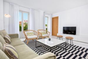 Televízia a/alebo spoločenská miestnosť v ubytovaní iloftmalaga Deluxe Alameda Principal