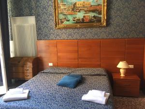 Postel nebo postele na pokoji v ubytování Casa Dolce