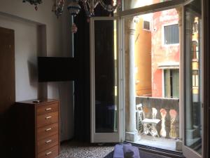 TV a/nebo společenská místnost v ubytování Casa Dolce
