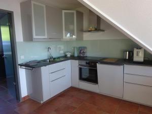 Kuchyň nebo kuchyňský kout v ubytování Ferienwohnung Haus am Barg