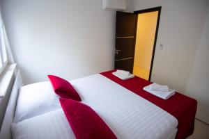 Postel nebo postele na pokoji v ubytování Residences Bellavista 3