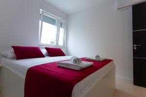 Postel nebo postele na pokoji v ubytování Residences Bellavista 3