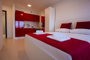 Postel nebo postele na pokoji v ubytování Residences Bellavista 3
