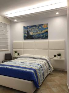 מיטה או מיטות בחדר ב-Re Vincy - Affittacamere