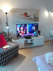 TV/Unterhaltungsangebot in der Unterkunft Luxury estudio Júpiter minerva