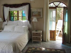 Katil atau katil-katil dalam bilik di Aurora Guest Units