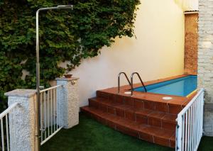 a hot tub on the side of a building at La Casa De Las Bicicletas in Cazorla