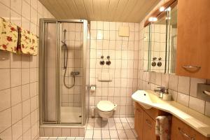 Ett badrum på Ferienwohnungen Bloier