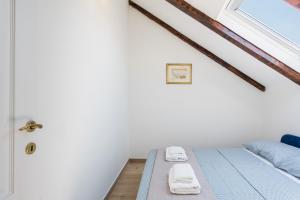 Voodi või voodid majutusasutuse Sugar Suite,Self Check In,Split City Center!! toas