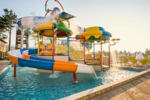 a water park with a slide in the water at SPA Hotel Elbrus in Velingrad +38 photos