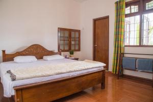Postel nebo postele na pokoji v ubytování Holiday Stay Inn