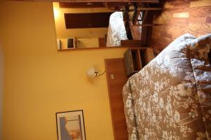 Postel nebo postele na pokoji v ubytování Hotel Vecchia Milano
