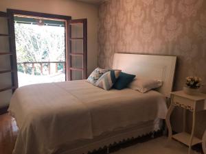 Postel nebo postele na pokoji v ubytování Paz e Aconchego. + 25 fotografií