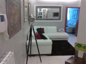 A bed or beds in a room at Loft 13- Suite 13 Struttura il Giglio